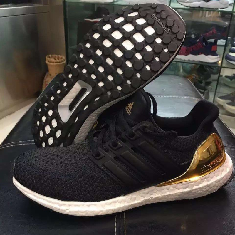 adidas-ultra-boost-black-gold-1_b3ziuj