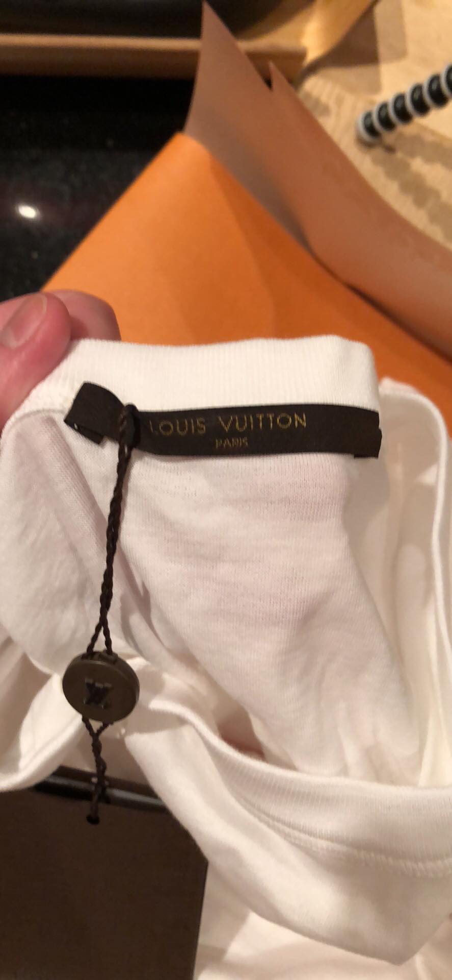Louis Vuitton shirt real vs fake. How to spot fake Louis Vuitton classic t  shirt 